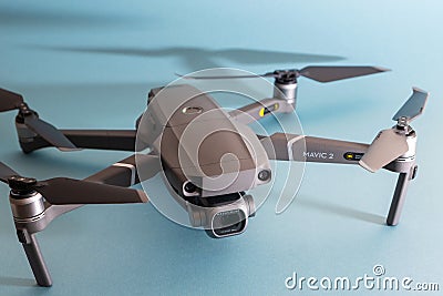 ST. PETERSBURG, RUSSIA - MARCH, 2019: DJI Mavic 2 pro with Hasselblad camera against blue background - an andvanced prosumer drone Editorial Stock Photo