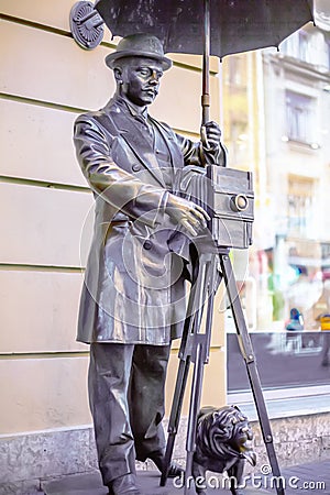 ST. PETERSBURG, RUSSIA - May 15, 2013: a bronze monument to the St. Petersburg Photographer. in Malaya Sadovaya Street in St. Pete Editorial Stock Photo