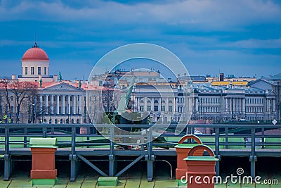 ST. PETERSBURG, RUSSIA, 17 MAY 2018: Outdoor view of unidentified man wearing uniform with an old artillery guns near Editorial Stock Photo