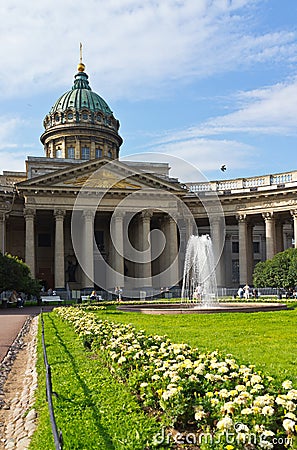 St. Petersburg. Tourists rest in the park near the Kazan Cathedral on a summer sunny day Editorial Stock Photo