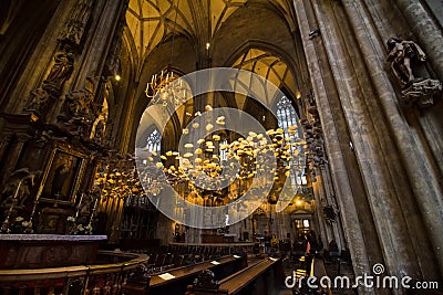 St. Stephen`s Cathedral in Wien downtown, seat of the Archbishop of Vienna, great interior of temple, sun rays shine on exhibitio Editorial Stock Photo