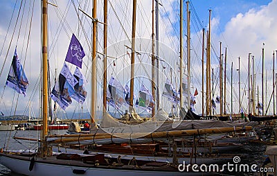 View on vintage sail ships with masts in a row in mediterranean Harbour on cloudy day Editorial Stock Photo
