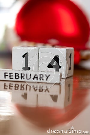 St. Valentine February 14 calendar of wooden cubes from the eternal calendar. Wooden background Stock Photo