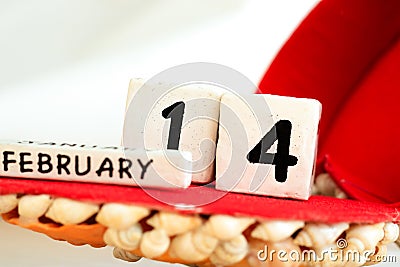 St. Valentine February 14 calendar of wooden cubes from the eternal calendar. Wooden background Stock Photo