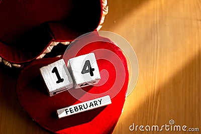 St. Valentine February 14 calendar of wooden cubes from the eternal calendar. Wooden background Stock Photo