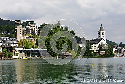 St. Wolfgang im Salzkammergut the shore of the lake and Catholic St. Wolfgang's Church in background. Austria, Europe. Stock Photo