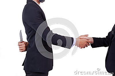 Stab back,two business men making a deal but hiding knives Stock Photo