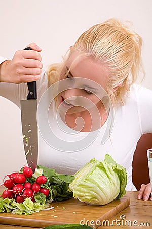 Stabbing the vegetables Stock Photo