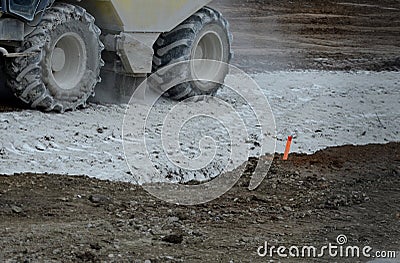 Stabilization of soil Unsuitable soils in construction are stabilized by mixing a bulldozer by adding a specified preparation of Stock Photo
