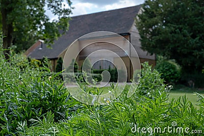 Stables at Eastcote House Gardens, next to the historic walled garden in Eastcote, Pinner, UK. Stock Photo
