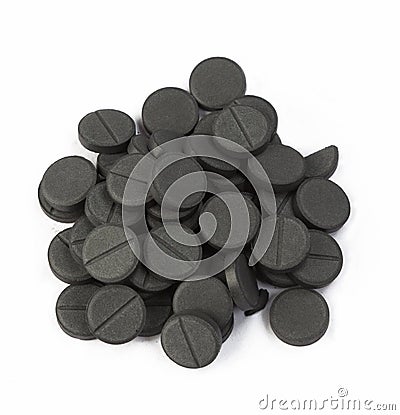 Stack of activated carbon on white background Stock Photo