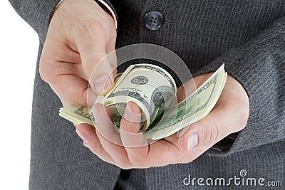 Stack banknotes of 100 dollars in male hands Stock Photo