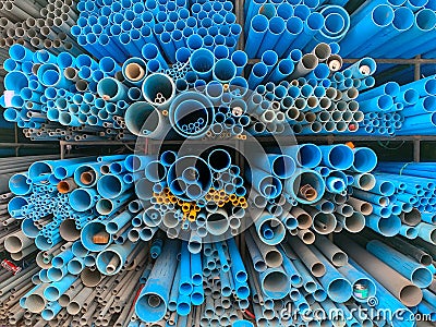 The stack of pipes in construction shop Stock Photo