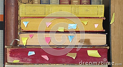 Stack of books with bookmarks. Reading,literature,education,library,home office, back to school concept,copy space Stock Photo