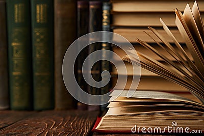 Stack of books on bookshelf, close-up. Education learning concep Stock Photo