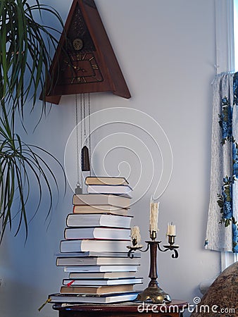 The stack of books and candles Stock Photo