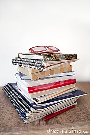 Stack of books on the shelf Stock Photo