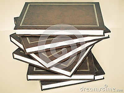 A stack of books on a white background Stock Photo