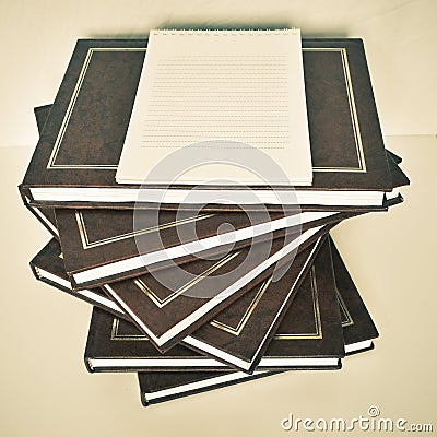 A stack of books on a white background Stock Photo