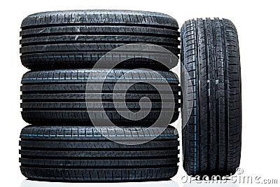 Stack of brand new high performance car tires Stock Photo