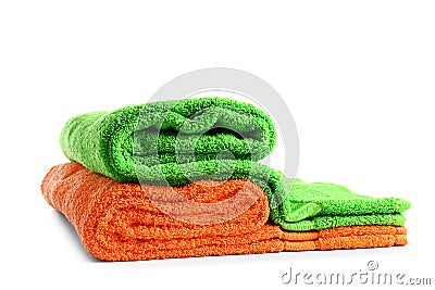 Stack of bright soft towels on white background Stock Photo