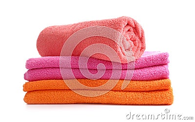 Stack of bright towels on white background Stock Photo
