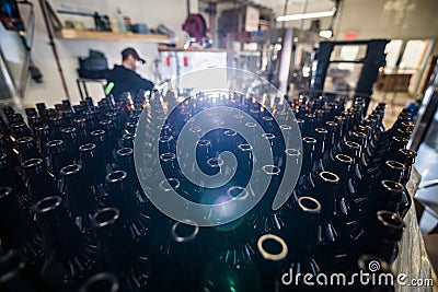 Stack of bottles on microbrewery Stock Photo