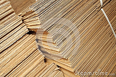 Stack of cardboard boxes, industrial background Stock Photo