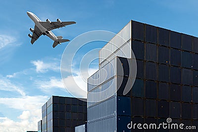 Stack of cargo containers at import and export area at port. Stock Photo