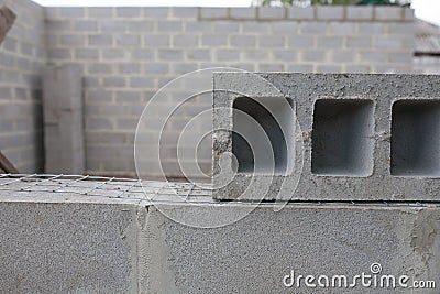 Stack of cement blocks at the construction site. Stock Photo