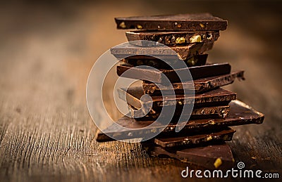 Stack chocolate on wooden table Stock Photo