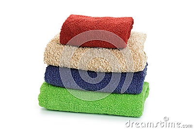 Stack of clean coloful soft towels on white background Stock Photo