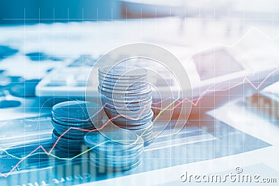 Stack coin money with report finance and banking with profit graph of stock Stock Photo