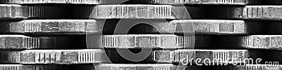 Stack of coins close up. Coin texture. Black and white business banner made of many coin edge. Economy finance and bank header. Stock Photo