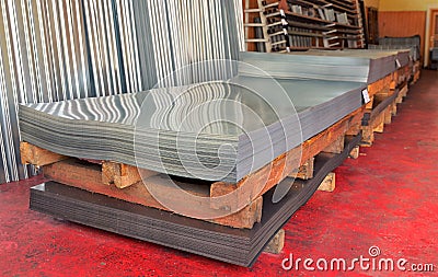 Cold steel coils in warehouse Stock Photo