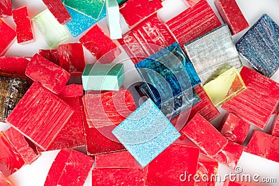 Stack of coloful glass mosaic tiles on white Stock Photo