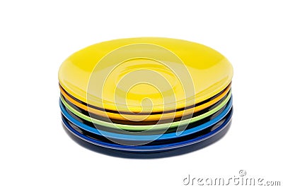 Stack of colored ceramic saucer Stock Photo