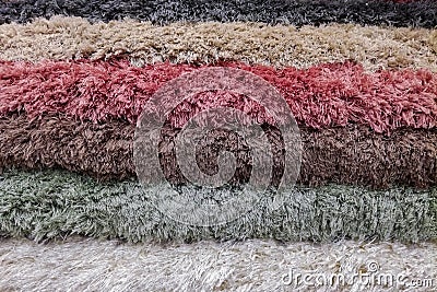 Stack of colorful carpets or rugs background Stock Photo