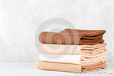 Stack of colorful cotton kitchen towels Stock Photo