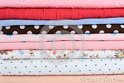 Stack of colorful fabrics Stock Photo