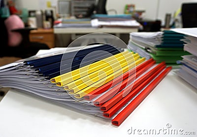 Stack of colorful folders on the table Stock Photo