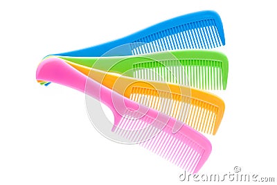 Stack of colourful hair comb on white . Stock Photo