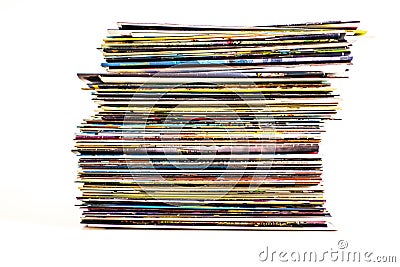 A stack of comic books isolated on a white background Stock Photo