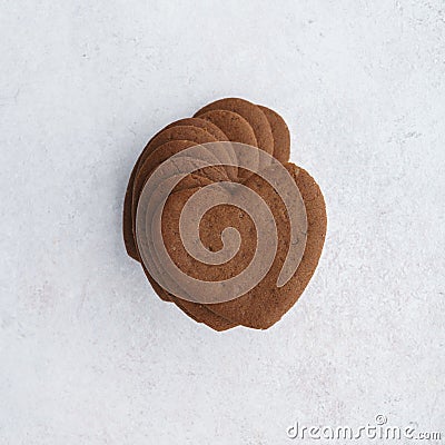 Stack of crispy chocolate heart shaped cookies. Sweet treats Stock Photo
