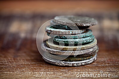 Stack of different ancient copper coins with patina Stock Photo