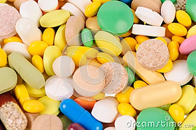 Heap of different colours pills Stock Photo