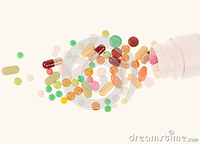 Heap of pills on the white background Stock Photo