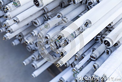 Stack of disused neon lamp tubes Stock Photo