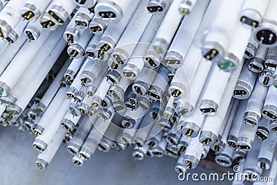 Stack of disused neon lamp tubes Stock Photo