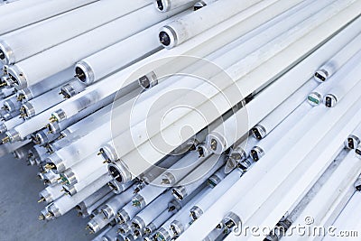 Stack of disused neon lamp tubes Stock Photo